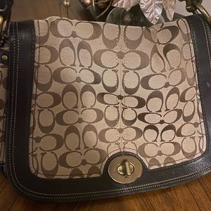 Very stylish Brown and Tan Coach shoulder bag.